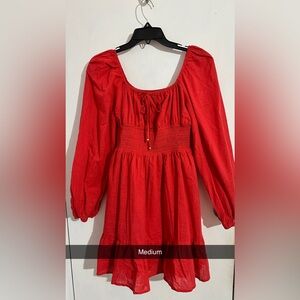 Never been worn, it’s actually burnt orange it’s not red